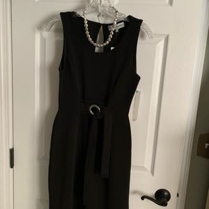 Ladies jumpsuit with wide leg styling .